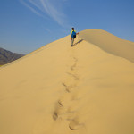 Walking to the top of Kelso Dunes in the Mojave National Preserve in California