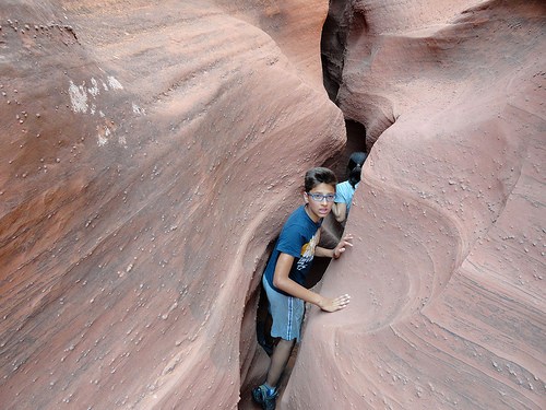 Entering the narrowest section of Spooky Gulch in the Dry Fork of Coyote Gulch in Grand Staircase-Escalante National Monument in Utah