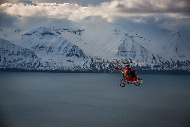 Heli-ski Tour over the Fjord with Troll Peninsula in the Background, North Iceland