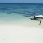 Pulau Pasi, Pantai Liang Kareta The white sandy beach of Pantai Liang Kareta in Pulau Pasi near Selayar Island in South Sulawesi Indonesia