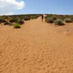 Prima si sale la collina... Walking Up to the Hill on Horseshoe Bend Trail near Page in Arizona