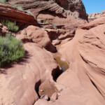 Siamo fortunati, nelle pozze c’è poca acqua Walking on the Rocks inside Waterholes Canyon near Page in Arizona