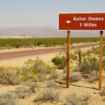 La Kelbaker Road Kelso Dunes Road sign at the corner with Kelbaker Road in the Mojave National Preserve in California