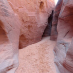 Ci voltiamo indietro Lower exit or lower entrance of Spooky Slot Canyon in the Dry Fork of Coyote Gulch in Grand Staircase Escalante National Monument