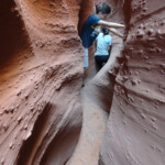 Inquietante… Navigating Spooky Gulch one of the thinnest and darkest slot canyons in Grand Staircase Escalante in Utah