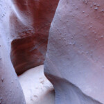 Svolte continue Winding passages inside Spooky Gulch in the Dry Fork of Coyote Gulch in Grand Staircase Escalante National Monument in Utah USA