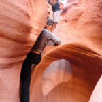 Ci divertiamo Family fun inside Peek-A-Boo Slot Canyon the Dry Fork of Coyote Gulch in Grand Staircase Escalante NM in Utah USA