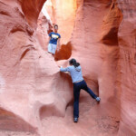 Un po’ di scrambling Scrambling in Peek-A-Boo Slot Canyon the Dry Fork of Coyote Gulch in Grand Staircase Escalante NM in Utah USA