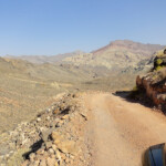 Ci avviciniamo... A series of sharp curves going down from Red Pass to Leadfield Ghost Town on Titus Canyon Road
