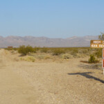 Siamo al roadhead High Clearance 4x4 Recommended sign at the roadhead of Titus Canyon Road on Hwy 374 in Nevada