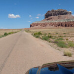 Driving on the road between Little Wild Horse Canyon Trailhead and Goblin Valley State Park Utah USA