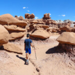 Walking in Valley 1 on the way to Valley 2 in Goblin Valley State Park Utah USA